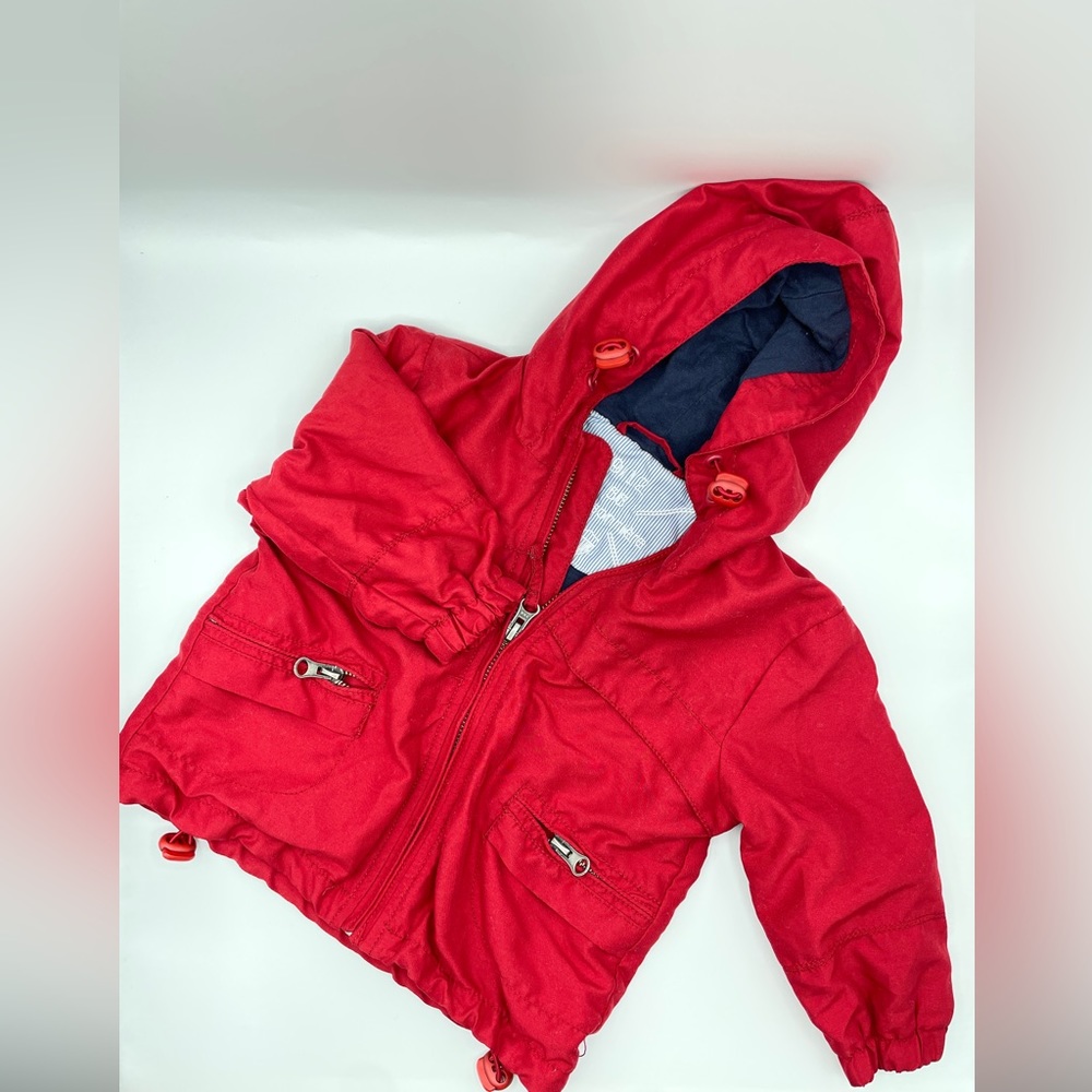 Belgian brand “Buissonnière” cute little red rain jacket. Excellent condition.